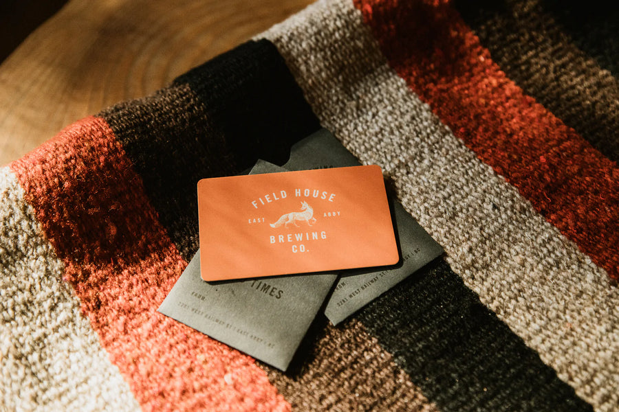 Field House Brewing's orange gift card. It's the perfect gift for that craft beer, local food, or awesome merch lover. It comes in multiple denominations. Let them choose from anything at our East Abbotsford Tasting Room.